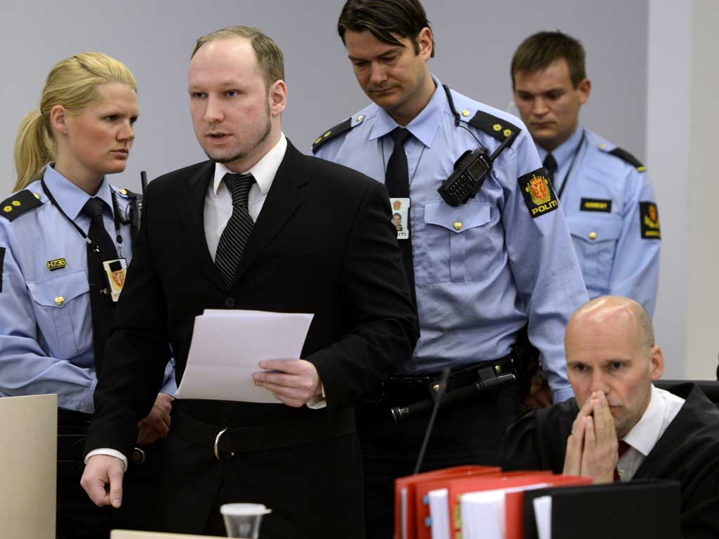 Anders Breivik takes his seat in the witness box on day three of his trial