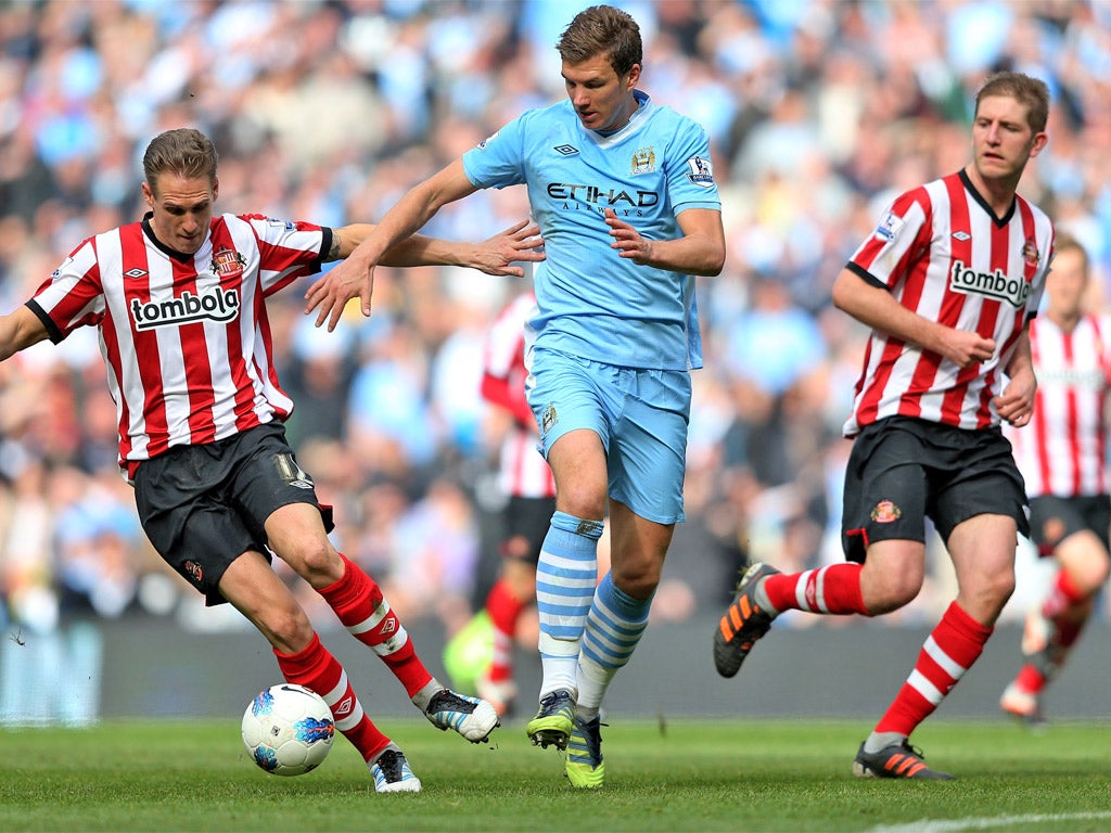 Edin Dzeko has failed to cement a spot in City's starting line-up