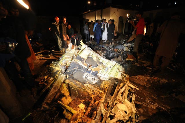 Officials at the site of the plane, which had flown from Karachi