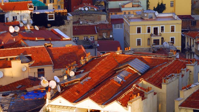 Winter evening sun on Pera - Beyoglu rooftops as seen from the Galata Tower