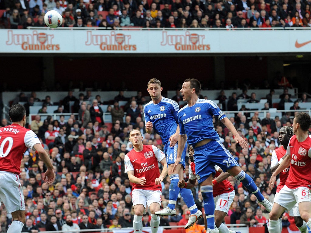 John Terry is unable to break the deadlock as he heads over the Arsenal bar at the Emirates