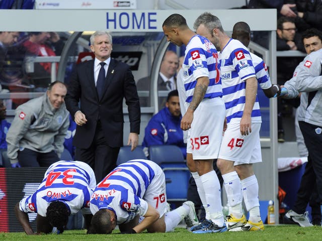 Take a bow: Adel Taarabt is joined by Taye Taiwo after putting Queens Park Rangers ahead with a first-half free-kick