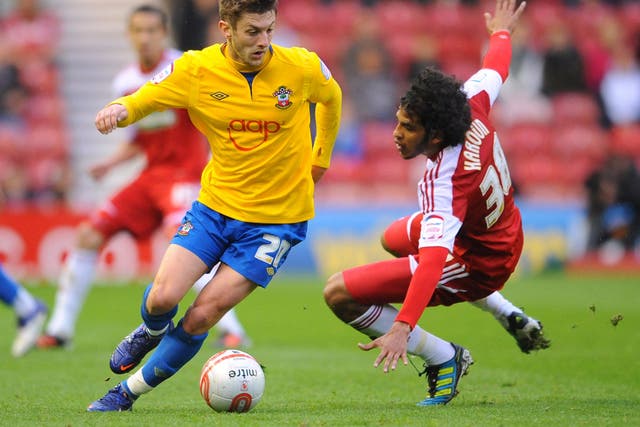 Fall guy: Southampton's Adam Lallana (left) proves too fast for Middlesbrough's Faris Haroun at the Riverside Stadium