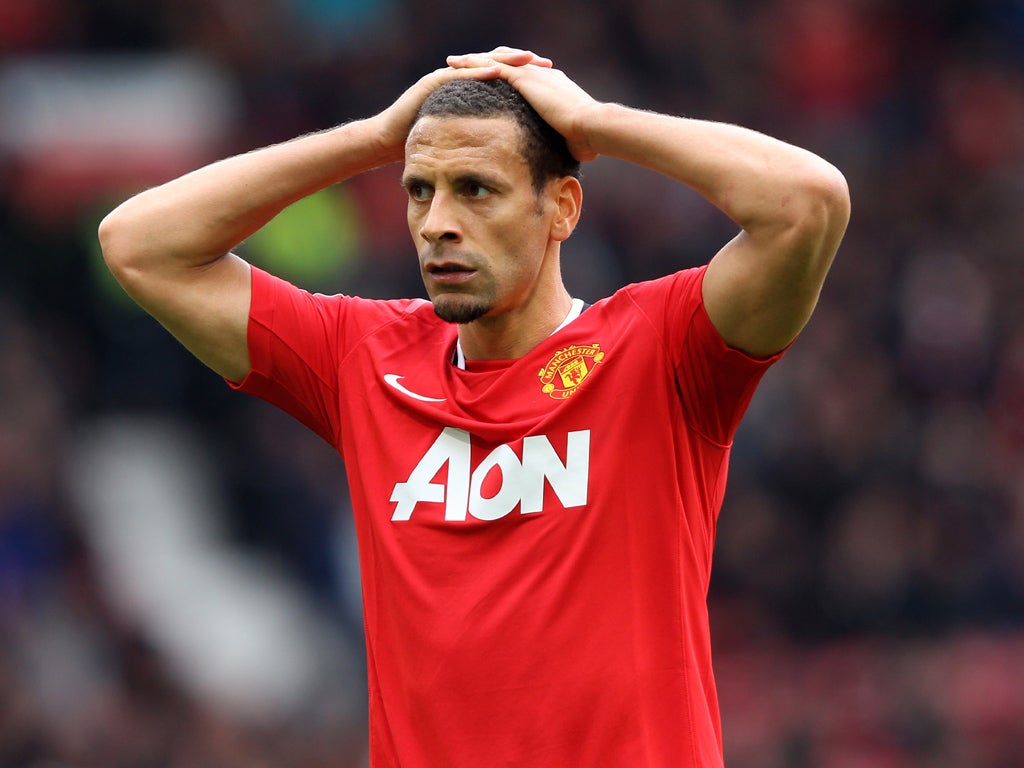 Rio Ferdinand shows his disappointment after Manchester United squandered a two goal lead against Everton