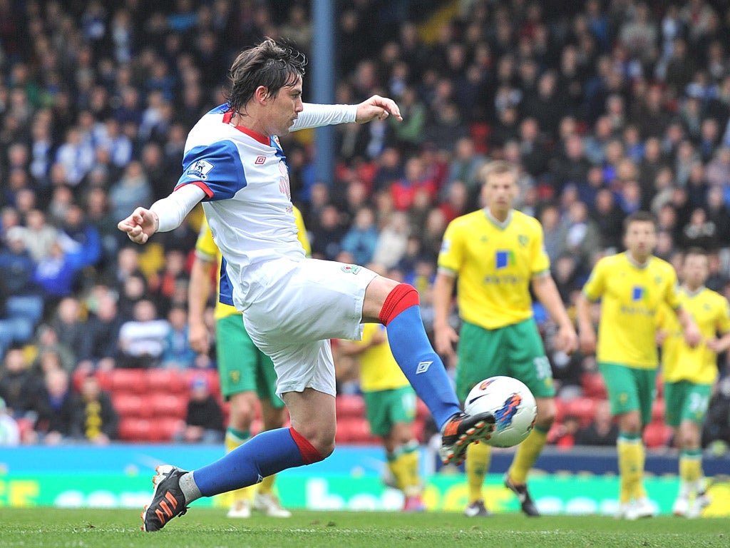 Blackburn’s Mauro Formica scores his side’s first
goal against Norwich at Ewood Park