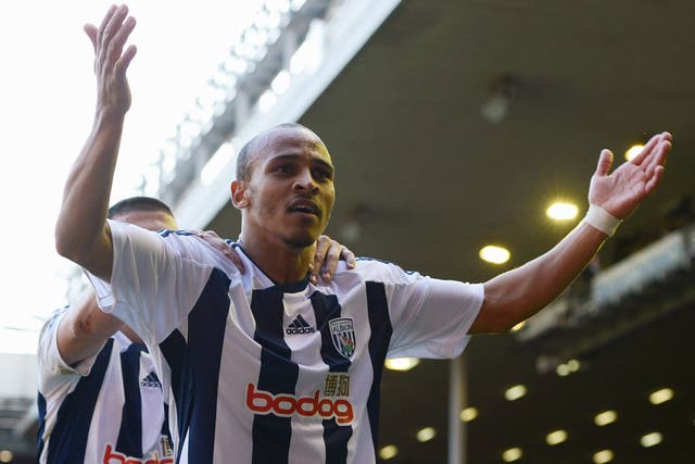 Peter Odemwingie enjoys his late winner at Anfield yesterday