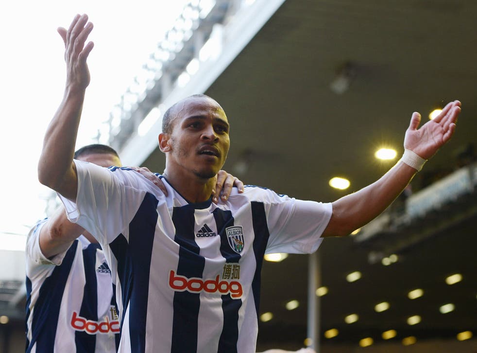 Peter Odemwingie enjoys his late winner at Anfield yesterday