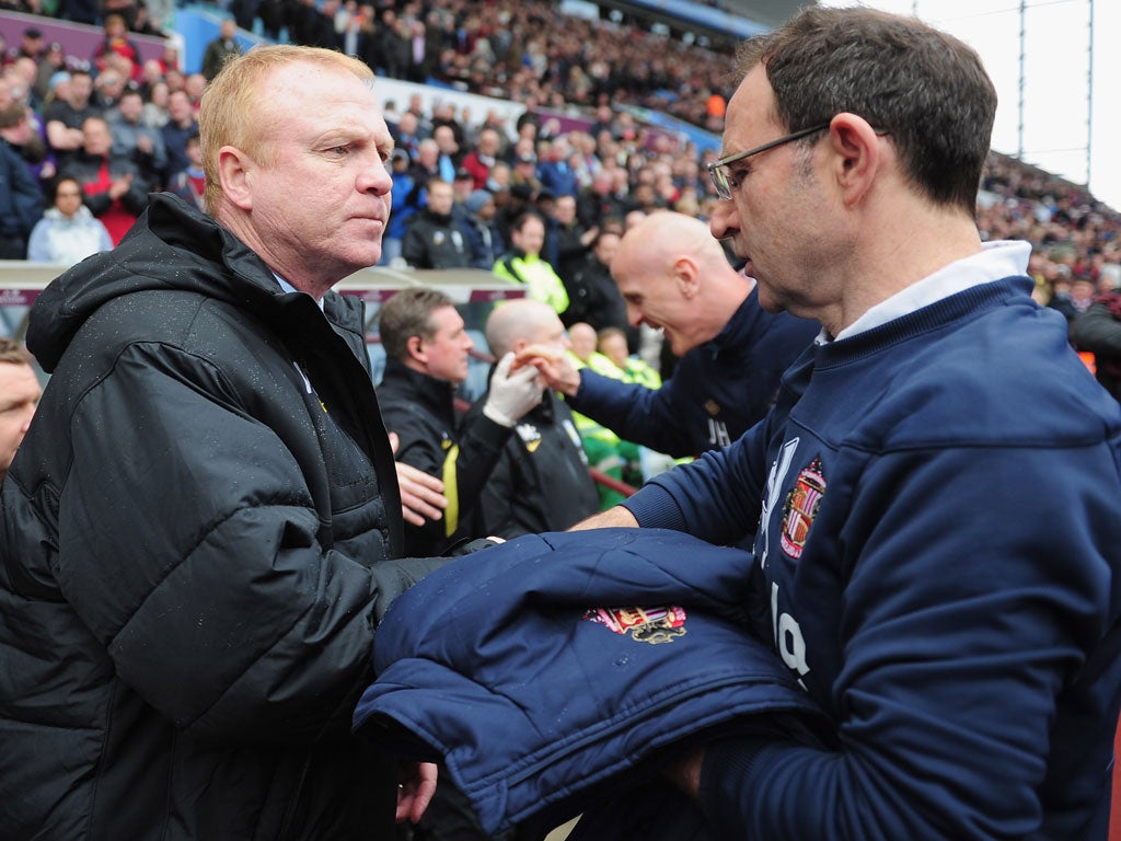 Martin O'Neill shakes hands with Alex McLeish