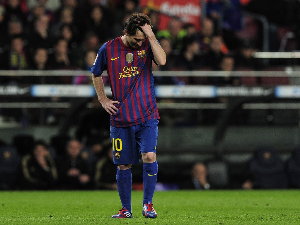 Lionel Messi reacts to defeat against Real Madrid