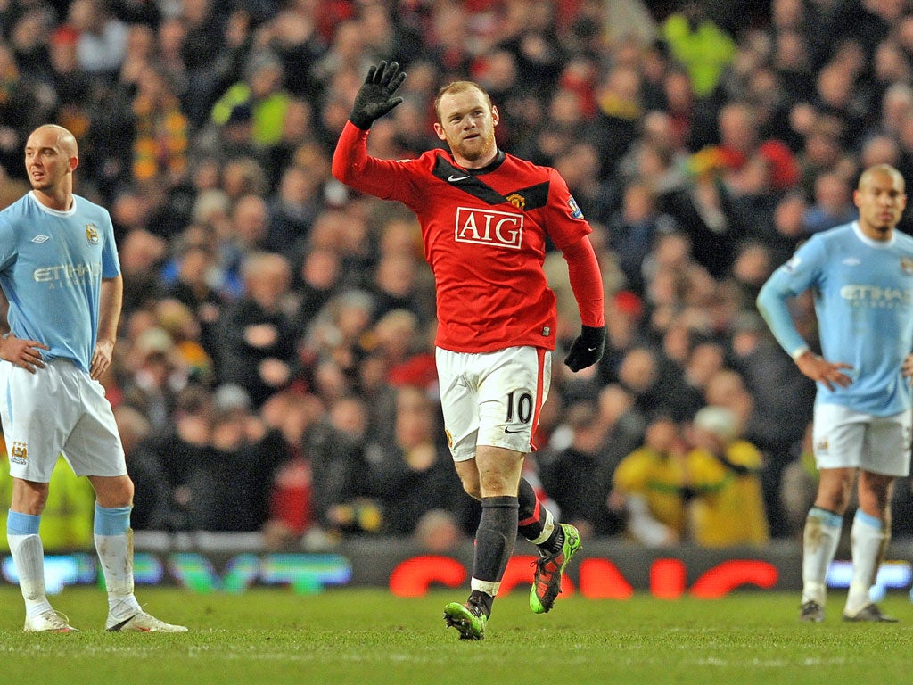 United’s Wayne Rooney after scoring in the Carling Cup semi-final in 2010