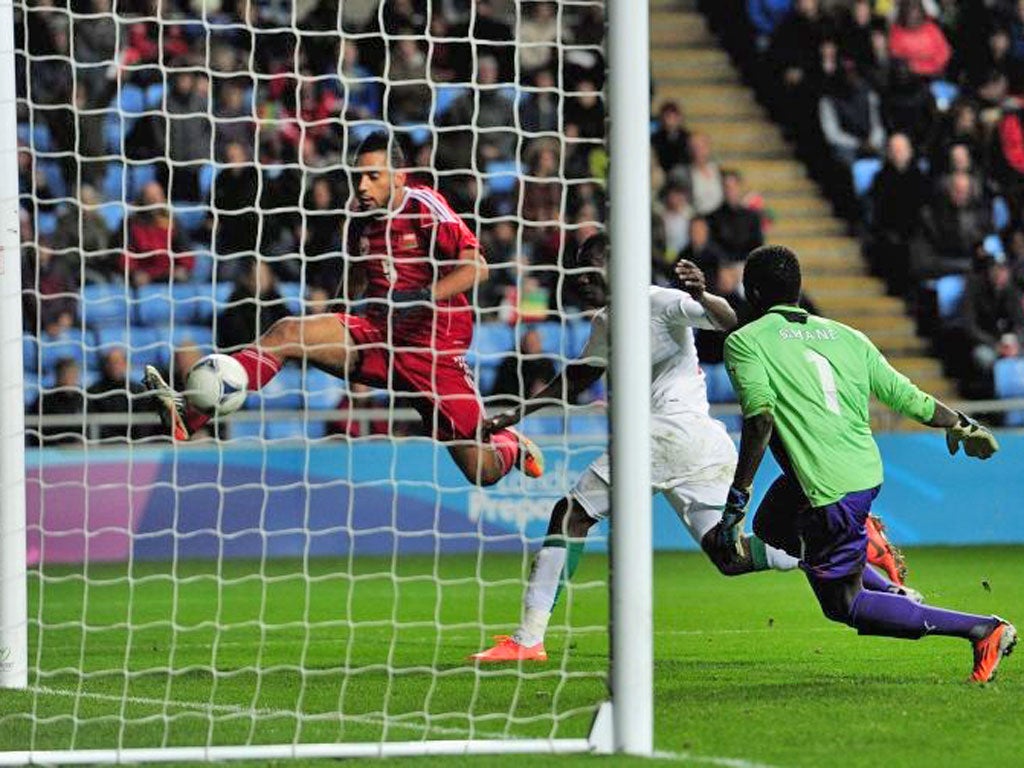 Mohammed Al Balushi of Oman misses an open goal last night