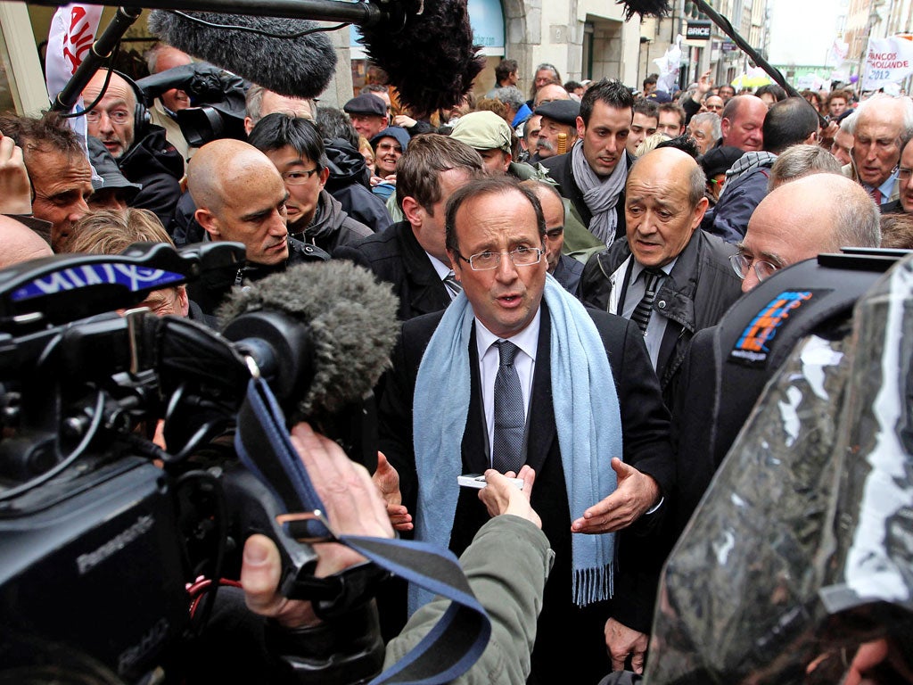 François Hollande in Quimper, western France,
yesterday after taking the lead in the first round of
the presidential election