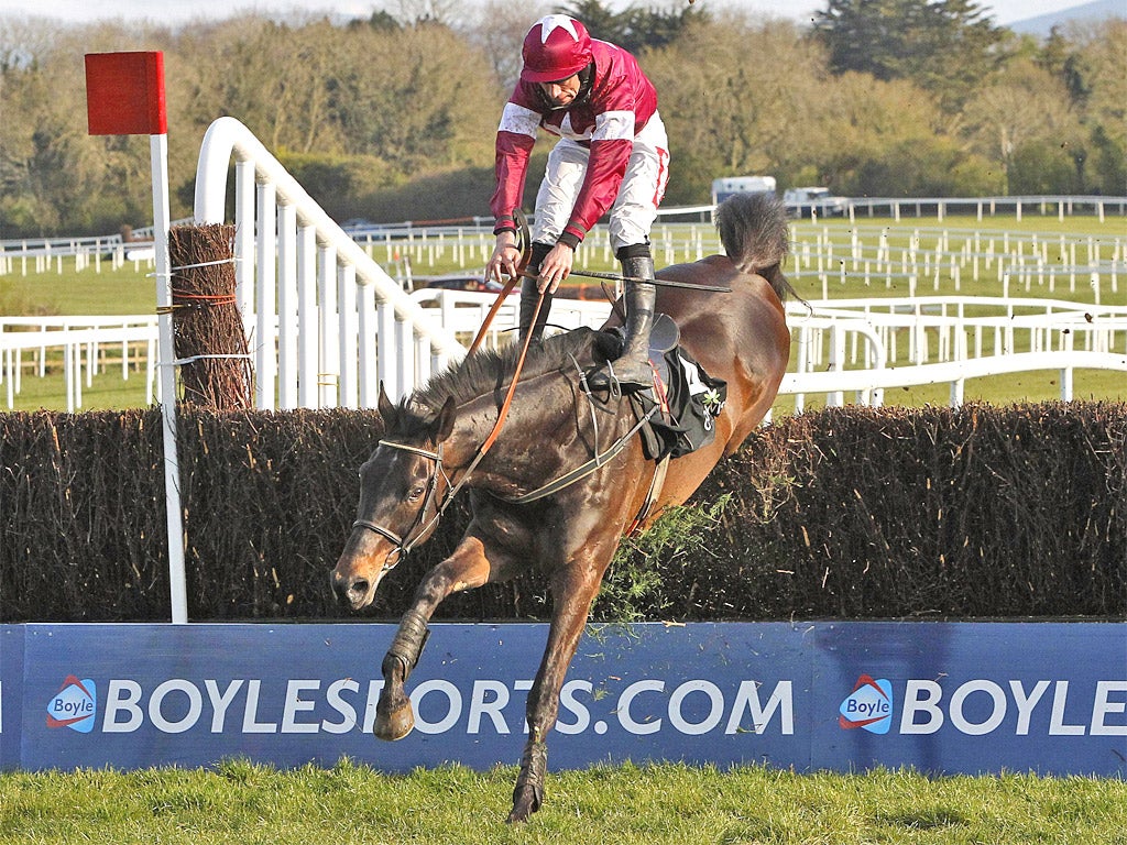 Sir Des Champs almost unseats Davy Russell at the last yesterday