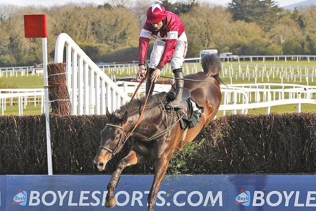 Sir Des Champs almost unseats Davy Russell at the last yesterday