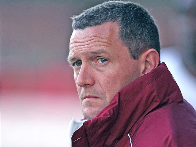 Northampton Town manager Aidy Boothroyd looks on during the League Two match at Crawley last week