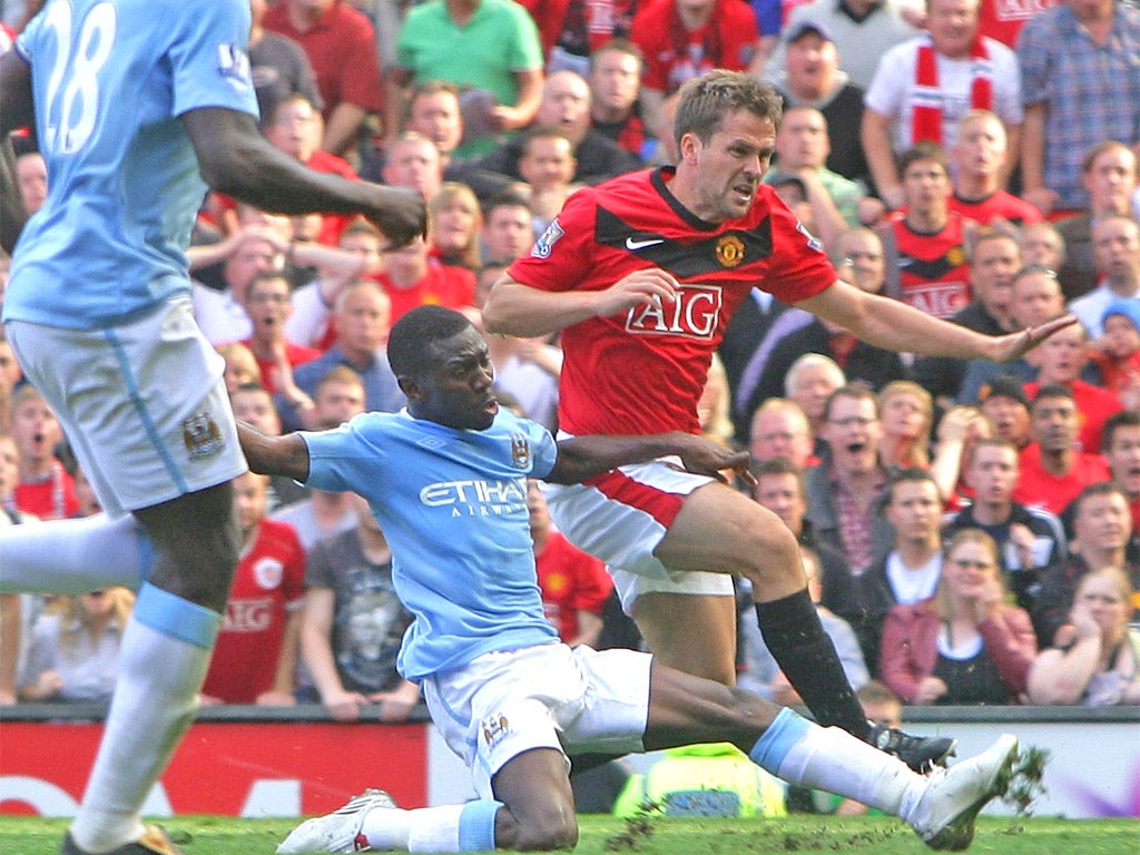 Michael Owen scores United's fourth goal in the 2009 derby