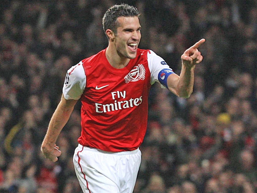 Arsenal striker Robin Van Persie doubles up as Player of the Year by