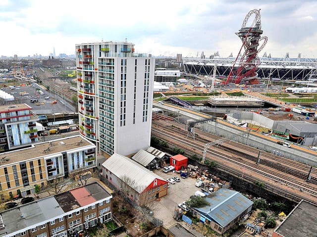 A view of housing and the Olympic Stadium in Newham, east London