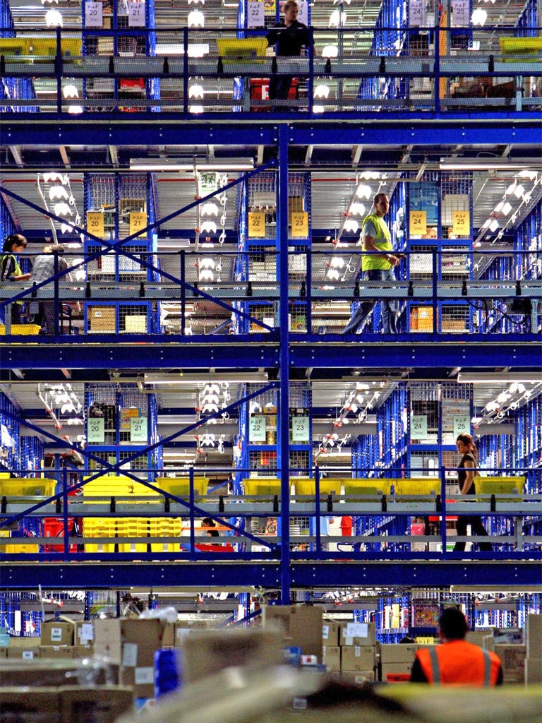 Take your pick: Amazon staff in a typical distribution centre in Milton Keynes. The US firm is now moving into the industrial-supply business