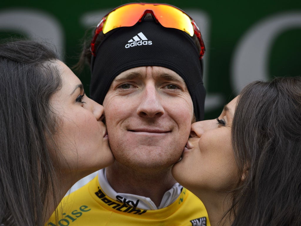 Bradley Wiggins is congratulated after taking the race lead of the Tour of Romandie