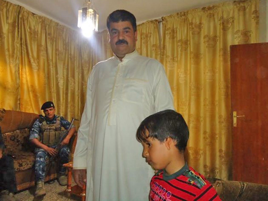 Five-year-old Sayef Ala’a with his father who hopes that foreign surgeons can rebuild his son’s ear