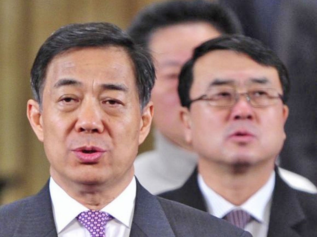 Bo Xilai, left, and his police chief and deputy mayor, Wang Lijun, at a conference in Chongqing earlier this year
