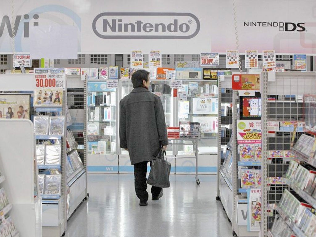 Console yourself: a Nintendo display in Japan – the company has posted its first public loss