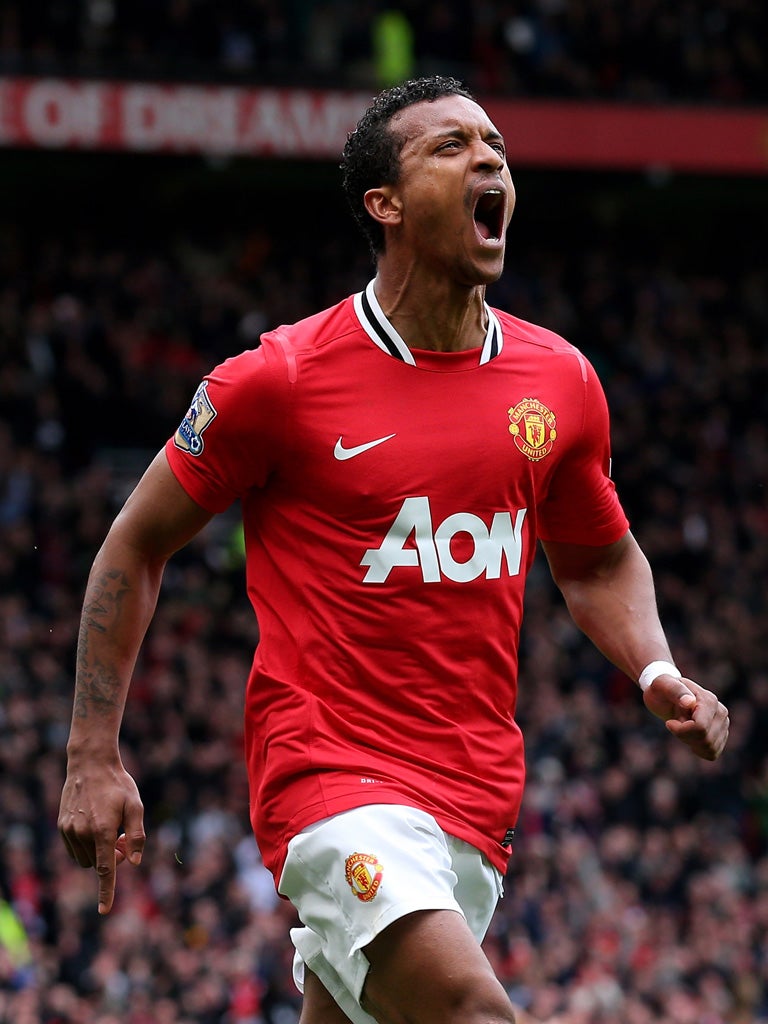 Manchester United's Luis Nani who has suffered a heavy tackle to his left ankle during training