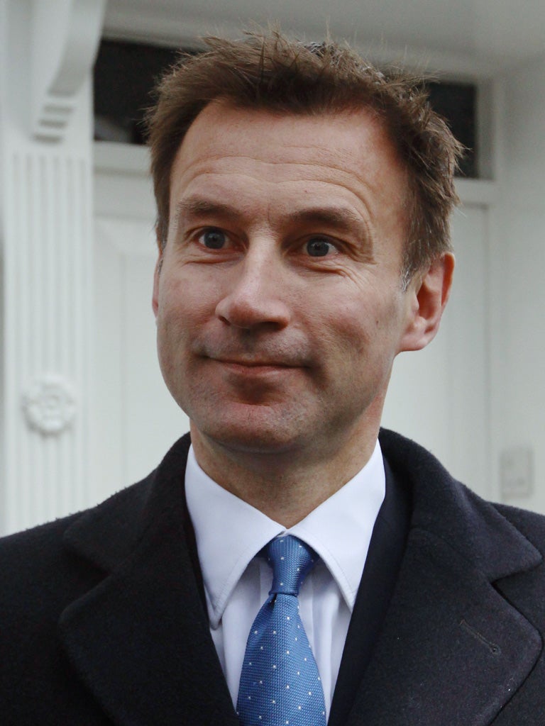 The embattled Culture Secretary Jeremy Hunt leaves his home in
London yesterday