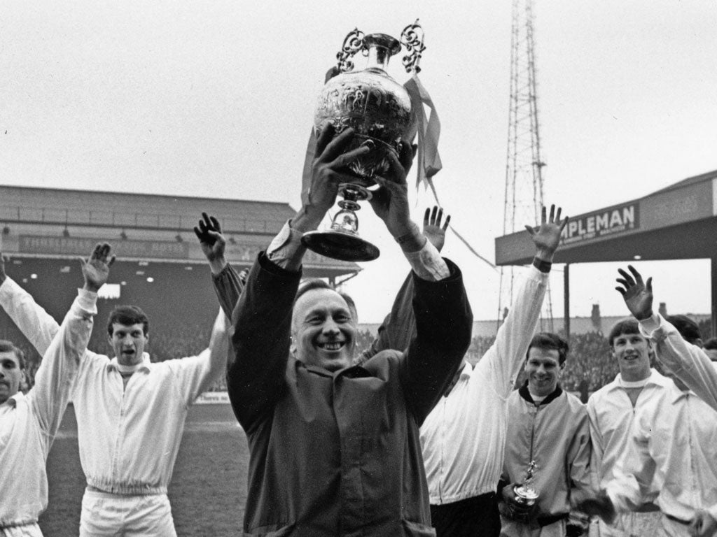 Quality of Mercer: City manager Joe Mercer holds the trophy in 1968