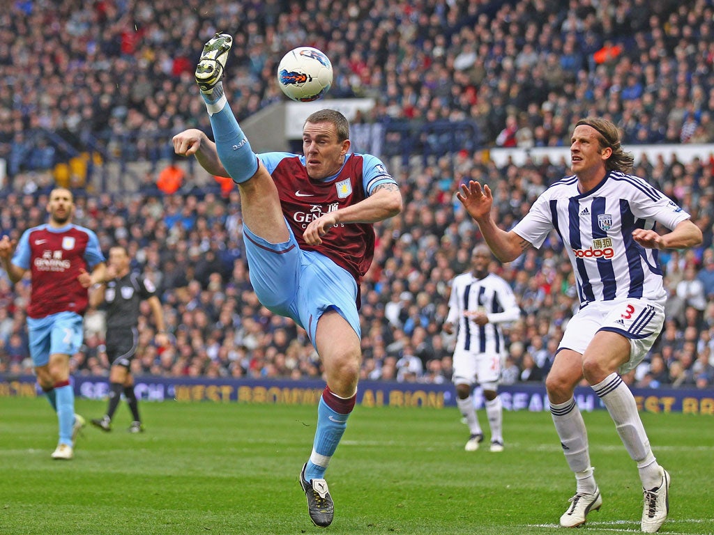 Richard Dunne repels a West Bromwich raid in yesterday’s 0-0 draw