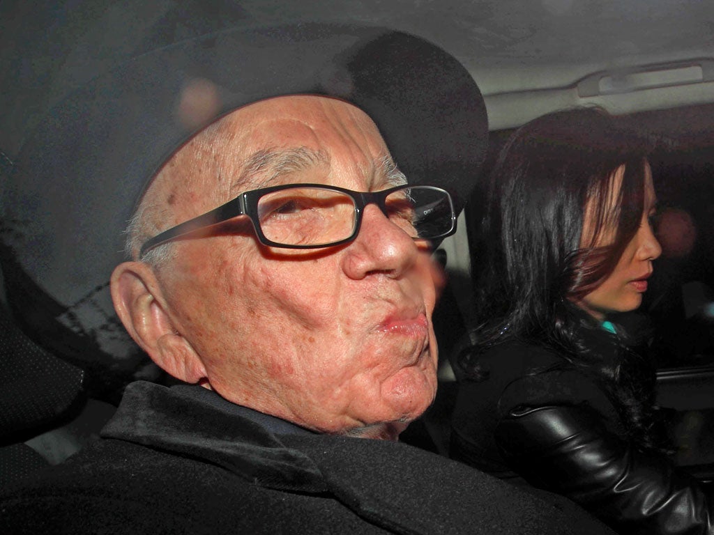 Rupert Murdoch after giving evidence at the Leveson inquiry