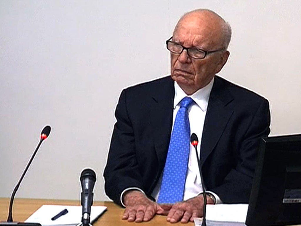 BURNING BRIDGES: Rupert Murdoch answers questions at the
Leveson inquiry on Thursday