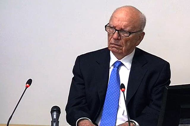 BURNING BRIDGES: Rupert Murdoch answers questions at the
Leveson inquiry on Thursday