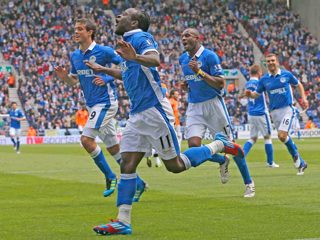 Wigan’s Victor Moses celebrates scoring in the rout of Newcastle
