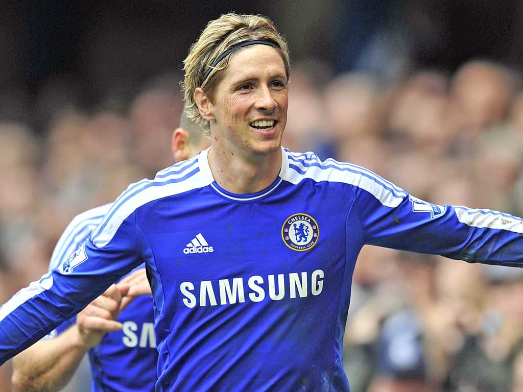 Fernando Torres celebrates his hat-trick