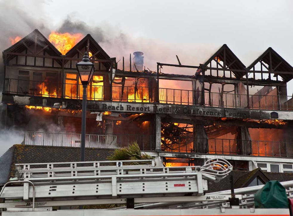 Around 100 firefighters tackled the blaze at The Falmouth Beach Hotel
