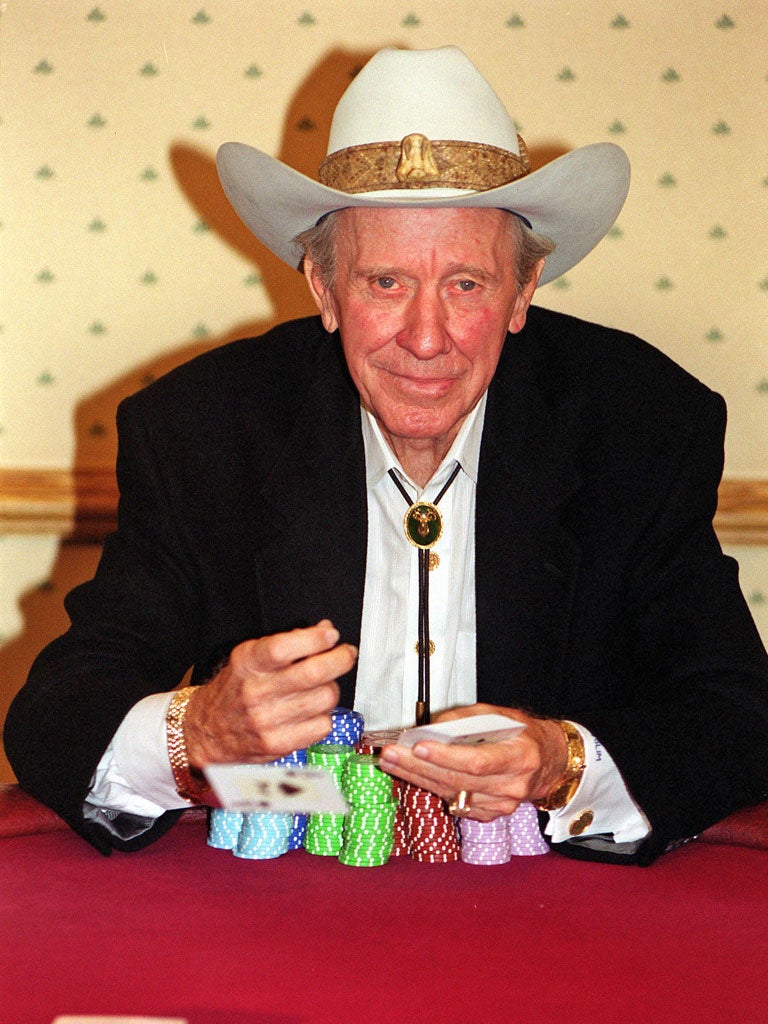 Five-time World Series of Poker champion Amarillo Slim at the table