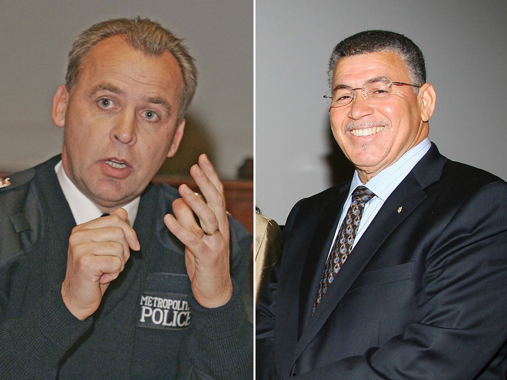 From left: Former Detective Chief Superintendent
Martin Bridger William McKeeva Bush and the Cayman Islands’ Premier