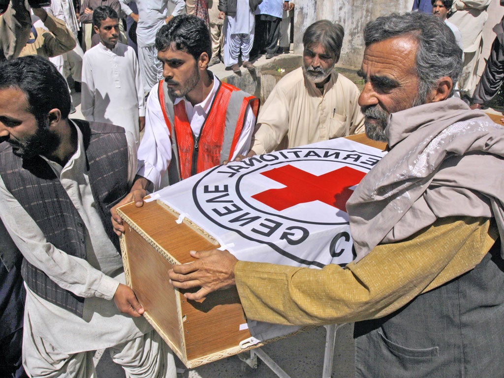 Hospital staff carry the coffin of Red Cross worker
Khalil Dale to an ambulance in Quetta, Pakistan, yesterday