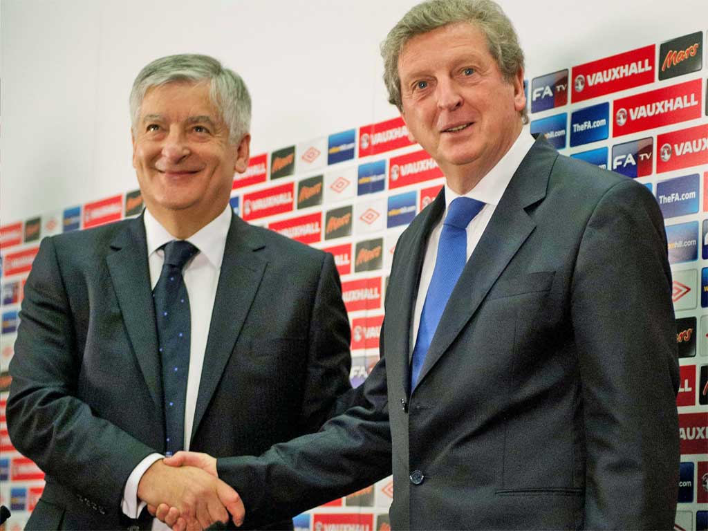 The newly appointed England manager, Roy Hodgson (right), shakes hands with the FA chairman, David Bernstein