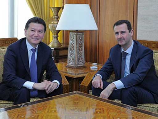 The head of the world chess federation, Kirsan Ilyumzhinov, meets Bashar al-Assad in Damascus