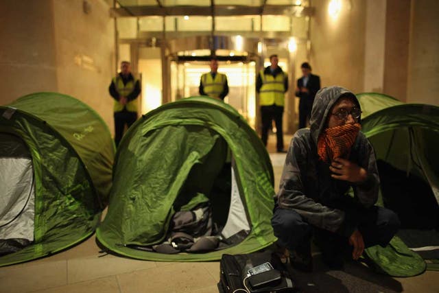 Anti-capitalist protesters from the Occupy movement set up tents outside the stock exchange in Paternoster Square yesterday