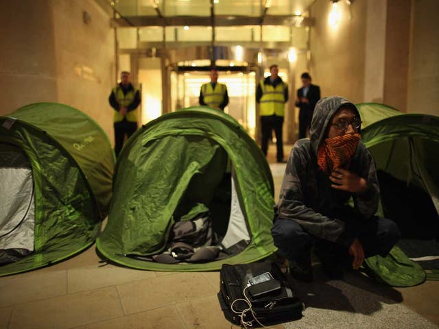 Anti-capitalist protesters from the Occupy movement set up tents outside the stock exchange in Paternoster Square yesterday