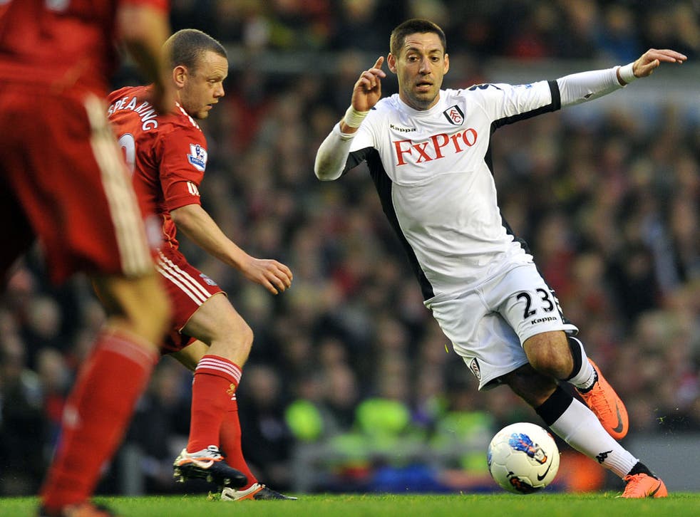 Fulham's Clint Dempsey in action against Liverpool