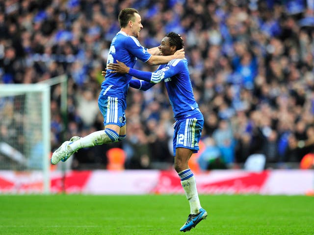 John Terry and John Obi Mikel celebrate at the final whistle