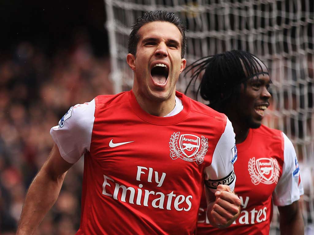 Daylight robbery: Robin van Persie celebrates scoring Arsenal's third goal and his second but his joy was short-lived