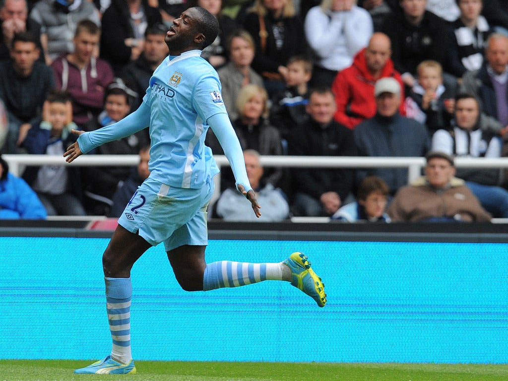 Yaya Toure scored a brace against Newcastle to keep Manchester City in contention for the Premier League title