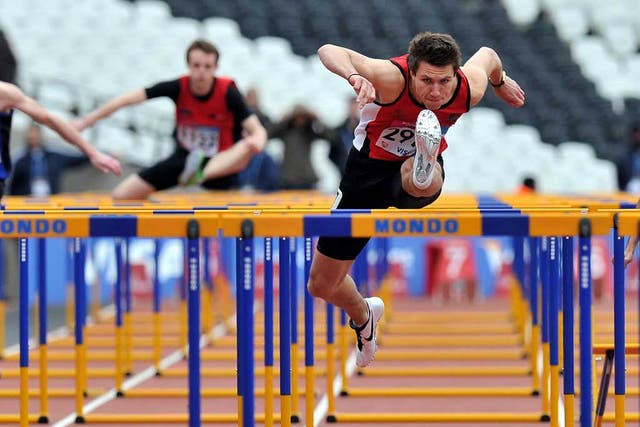 Andy Pozzi competes in the 110m hurdles at the Olympic Stadium
