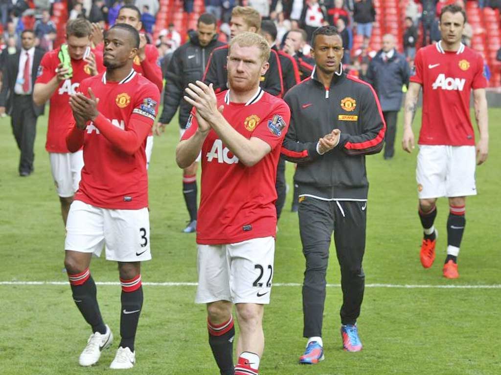 The expressions on the faces of the Manchester United players tell their own story after the final whistle yesterday
